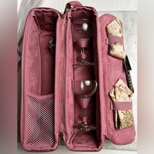 Wine Travel Case. includes bottle opener, cork stop, 2 glasses and napkins.